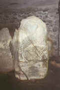 zig-zag anthropomorphic patterned stone inside Barclodiad chamber