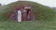 entrance and replica standing stone (real one in Cardiff Museum)