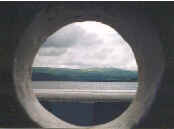 view through the porthole of the stone boat